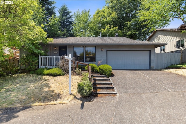 16445 SW Meadowood Way, Portland, OR 97224 - view of front facade with concrete driveway, an attached garage, and a porch