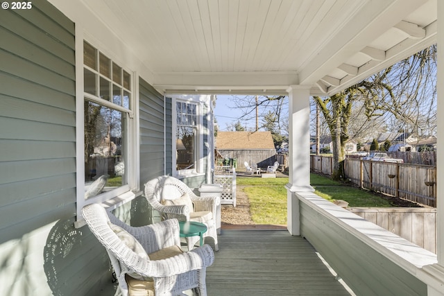 deck featuring a yard