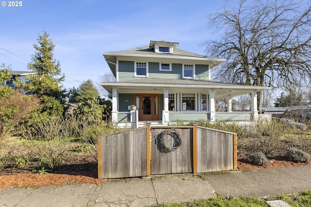 view of front of property featuring covered porch