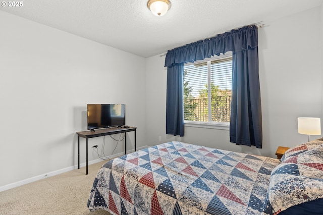 1845 S 15th Ct, Ridgefield, WA 98642 - carpeted bedroom with baseboards and a textured ceiling