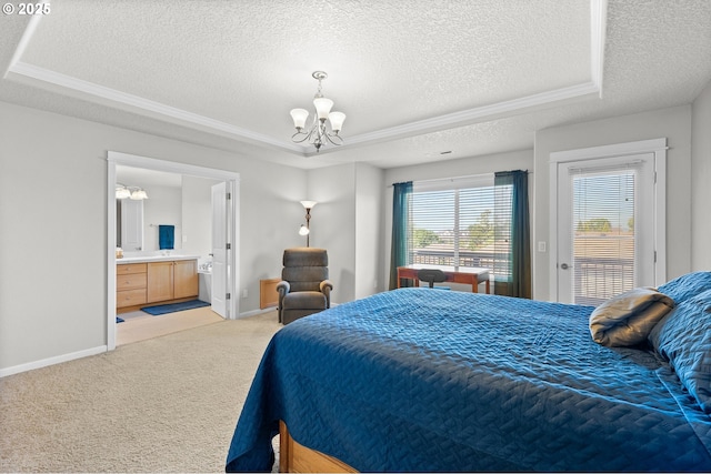 1845 S 15th Ct, Ridgefield, WA 98642 - bedroom with a chandelier, a textured ceiling, light colored carpet, baseboards, and ensuite bath