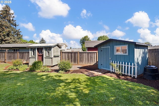 view of yard with a storage unit and an outdoor structure