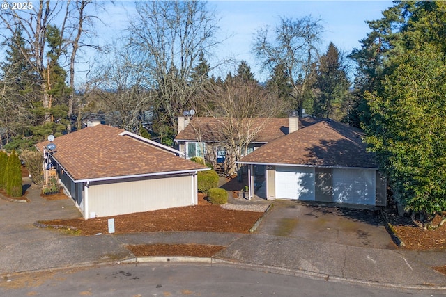 single story home with a garage