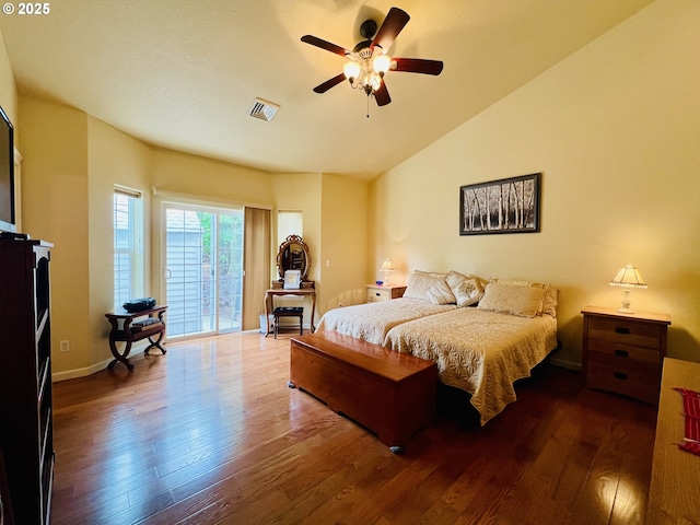 2295 Chi Chi Ln, Sutherlin, OR 97479 - bedroom featuring access to exterior, wood-type flooring, lofted ceiling, ceiling fan, and baseboards