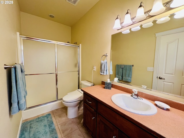 2295 Chi Chi Ln, Sutherlin, OR 97479 - bathroom with vanity, toilet, a stall shower, and tile patterned floors