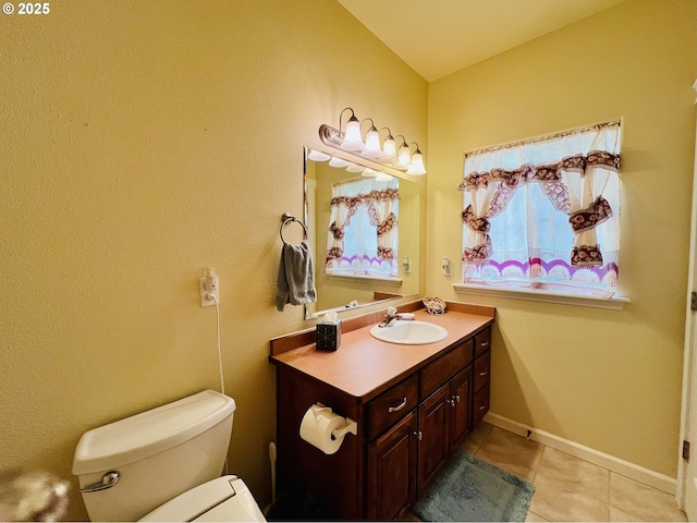 2295 Chi Chi Ln, Sutherlin, OR 97479 - bathroom with toilet, vanity, tile patterned floors, and baseboards
