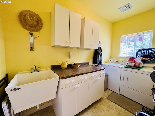 2295 Chi Chi Ln, Sutherlin, OR 97479 - laundry room with washing machine and clothes dryer and cabinet space