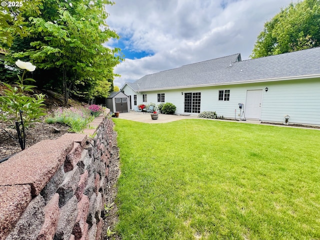 2295 Chi Chi Ln, Sutherlin, OR 97479 - rear view of house featuring a patio area, a yard, and a shingled roof