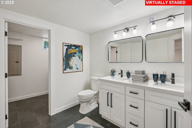 6445 N Amherst St, Portland, OR 97203 - bathroom featuring electric panel, double vanity, and tile patterned floors