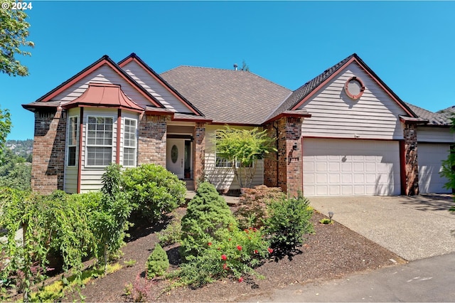 view of front of property with a garage