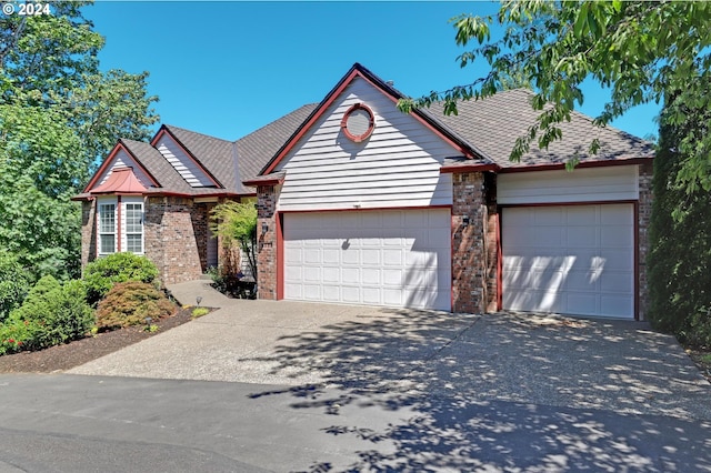 view of front of property with a garage