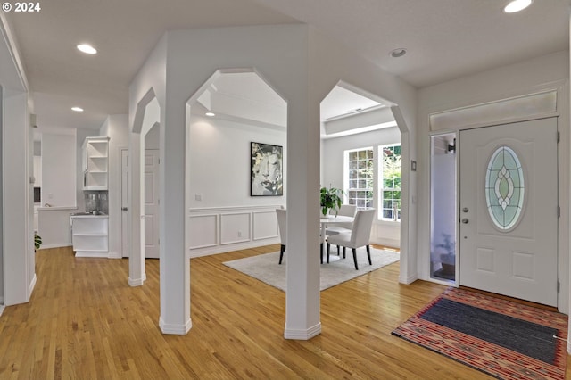 entrance foyer with light hardwood / wood-style flooring