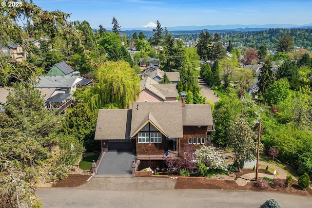 drone / aerial view featuring a mountain view