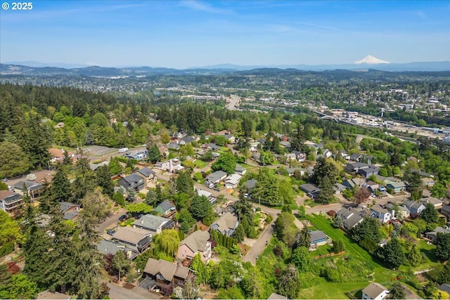 birds eye view of property featuring a mountain view and a residential view