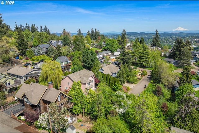 bird's eye view featuring a residential view and a mountain view
