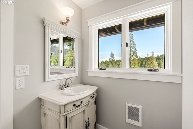 bathroom featuring visible vents and vanity