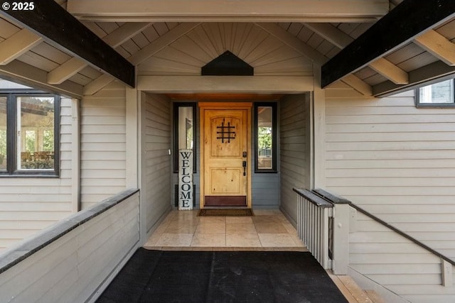 property entrance with covered porch