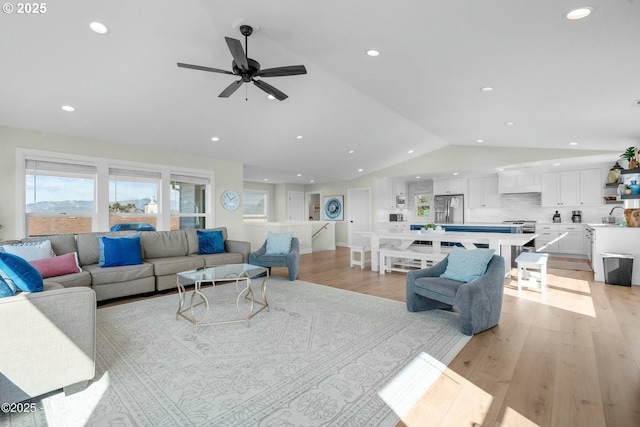 2150 NW Inlet Ave, Lincoln City, OR 97367 - living room with light wood-style floors, recessed lighting, ceiling fan, and lofted ceiling