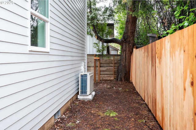 view of property exterior featuring central AC unit