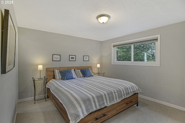 1842 SW Lobelia St, Portland, OR 97219 - bedroom with carpet and a textured ceiling