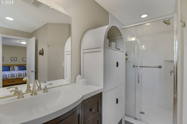 1842 SW Lobelia St, Portland, OR 97219 - full bathroom featuring vanity, a shower stall, ensuite bath, and recessed lighting