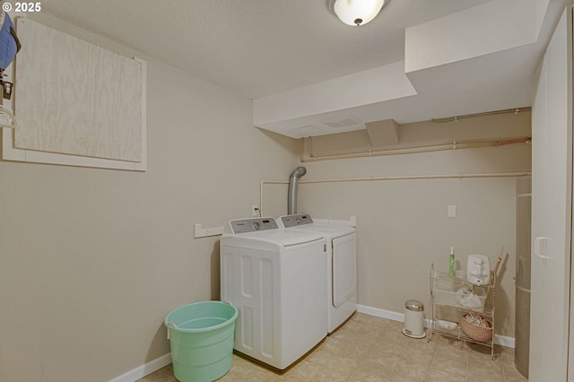 1842 SW Lobelia St, Portland, OR 97219 - laundry area featuring washer and dryer and baseboards