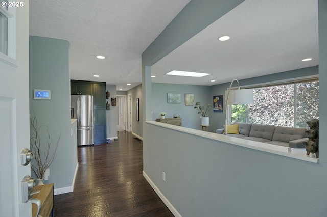 1842 SW Lobelia St, Portland, OR 97219 - corridor featuring dark wood-style flooring and recessed lighting