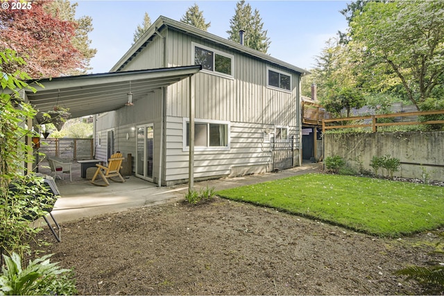 1842 SW Lobelia St, Portland, OR 97219 - rear view of property with a patio and a fenced backyard