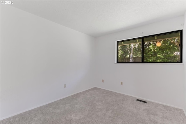 11560 SW Settler Way, Beaverton, OR 97008 - empty room featuring carpet and baseboards