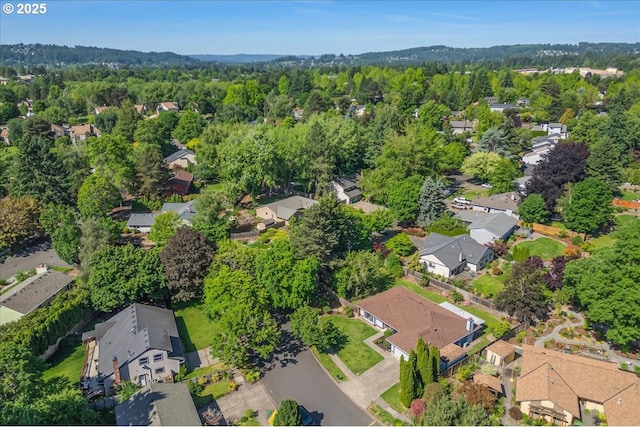 11560 SW Settler Way, Beaverton, OR 97008 - aerial view of property and surrounding area with nearby suburban area and a heavily wooded area