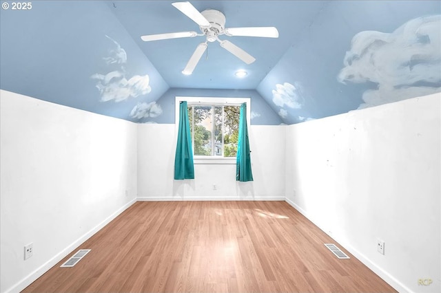 146 NE Jefferson St, Hillsboro, OR 97124 - additional living space with lofted ceiling, visible vents, and wood finished floors