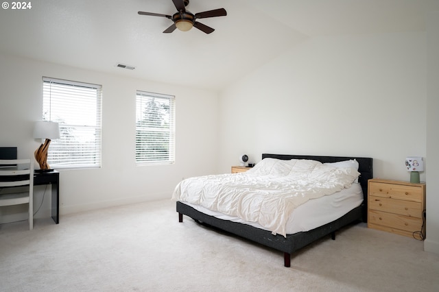 bedroom featuring ceiling fan, carpet, and vaulted ceiling