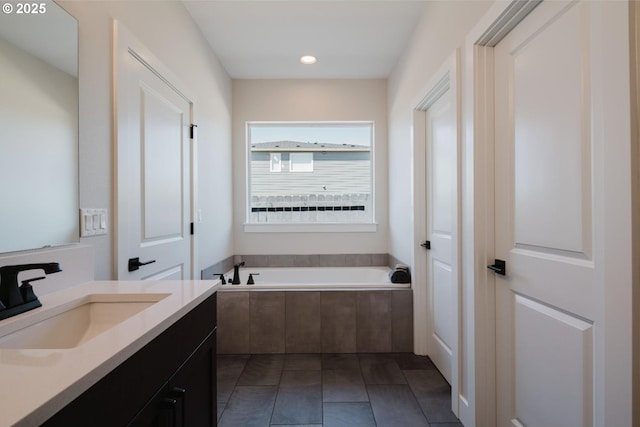 1303 S 46th Pl, Ridgefield, WA 98642 - bathroom with a garden tub, tile patterned flooring, vanity, and recessed lighting