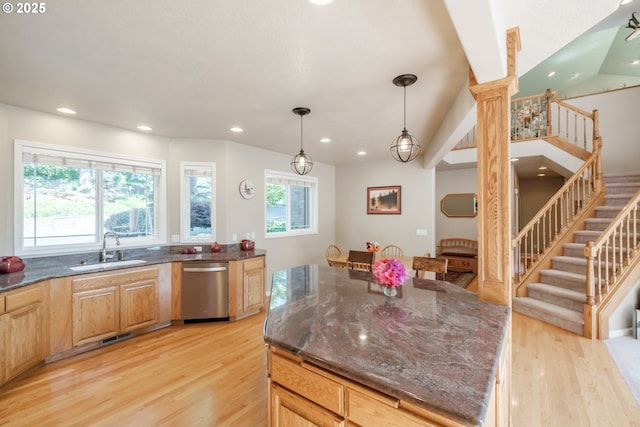 37676 Kathleen Ct, Lebanon, OR 97355 - kitchen featuring stainless steel dishwasher, a sink, light wood finished floors, recessed lighting, and dark stone countertops