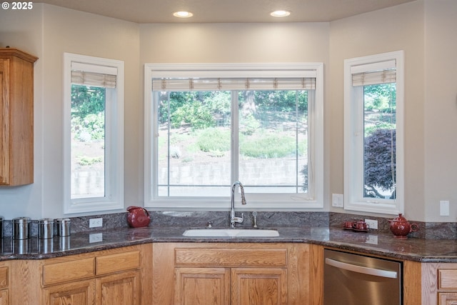 37676 Kathleen Ct, Lebanon, OR 97355 - kitchen with stainless steel dishwasher, a sink, plenty of natural light, dark stone counters, and recessed lighting
