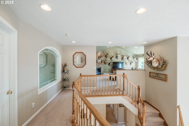 37676 Kathleen Ct, Lebanon, OR 97355 - corridor featuring recessed lighting, an upstairs landing, light colored carpet, and baseboards