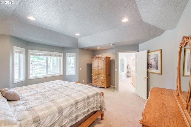 37676 Kathleen Ct, Lebanon, OR 97355 - bedroom featuring light colored carpet, a textured ceiling, recessed lighting, and baseboards
