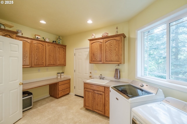 37676 Kathleen Ct, Lebanon, OR 97355 - washroom featuring washer and clothes dryer, cabinet space, healthy amount of natural light, recessed lighting, and a desk