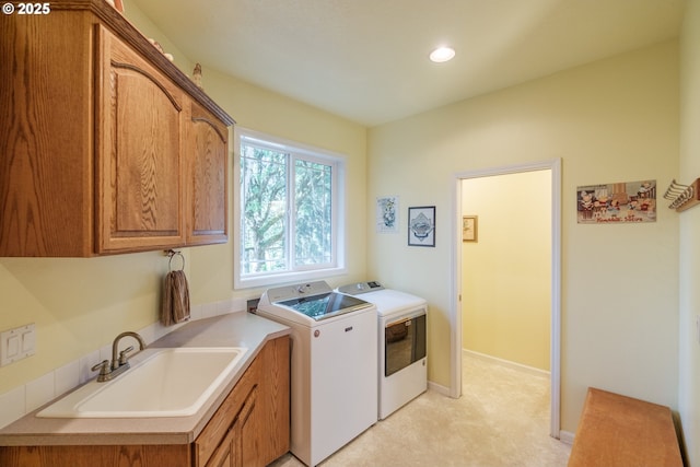 37676 Kathleen Ct, Lebanon, OR 97355 - laundry room featuring washer and dryer, cabinet space, baseboards, and recessed lighting