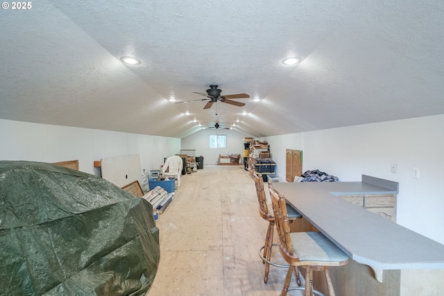 37676 Kathleen Ct, Lebanon, OR 97355 - bonus room with ceiling fan, vaulted ceiling, and a textured ceiling
