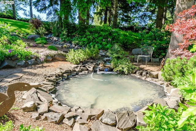 37676 Kathleen Ct, Lebanon, OR 97355 - view of patio / terrace with a small pond
