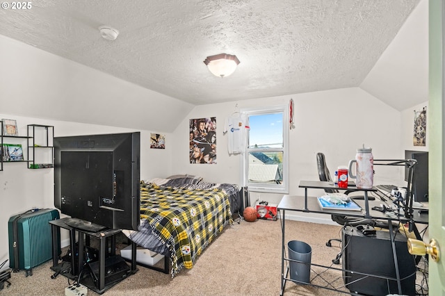 410 E D St, Rainier, OR 97048 - bedroom with lofted ceiling, carpet floors, and a textured ceiling