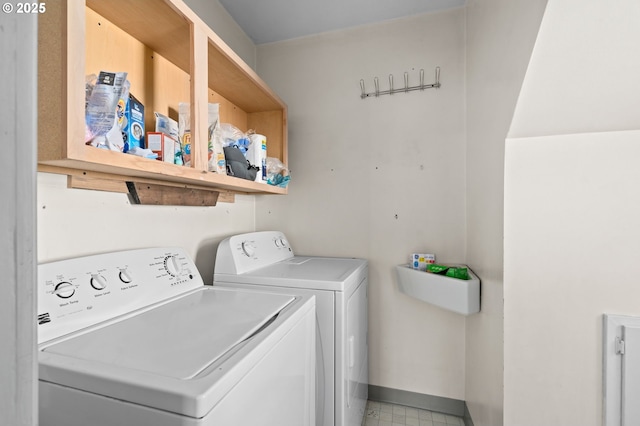 410 E D St, Rainier, OR 97048 - laundry room with washing machine and clothes dryer and baseboards