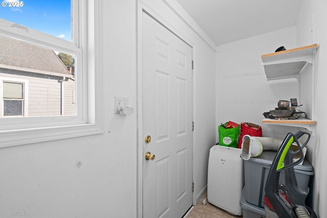410 E D St, Rainier, OR 97048 - laundry room with light tile patterned flooring