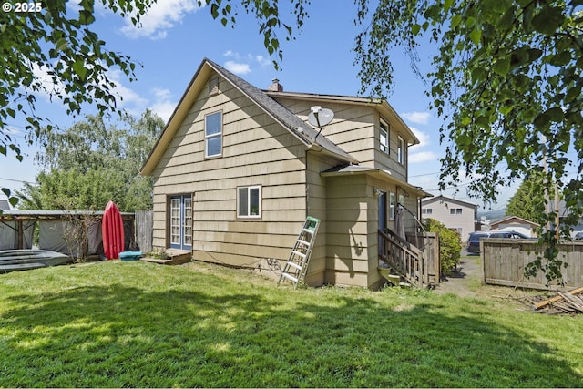 410 E D St, Rainier, OR 97048 - back of property with a chimney