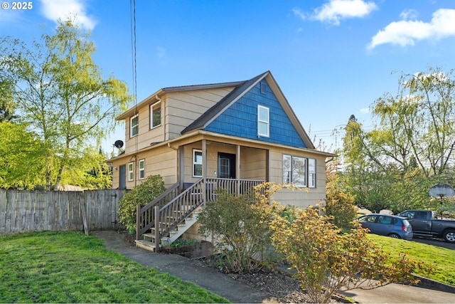410 E D St, Rainier, OR 97048 - view of front of house featuring a porch