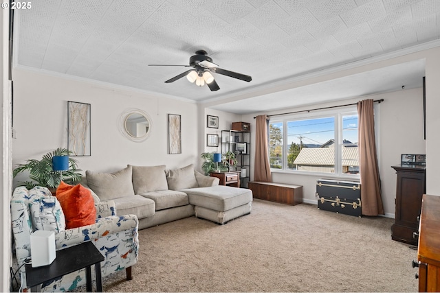 410 E D St, Rainier, OR 97048 - living area featuring a ceiling fan, crown molding, carpet flooring, and baseboards