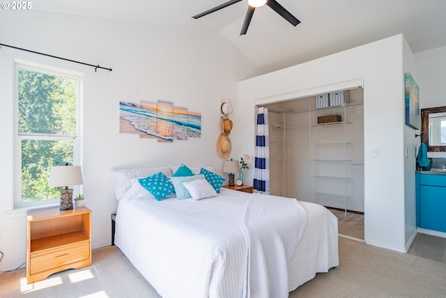 42810 NE 244th Ave, Amboy, WA 98601 - carpeted bedroom featuring lofted ceiling, a closet, multiple windows, and ceiling fan