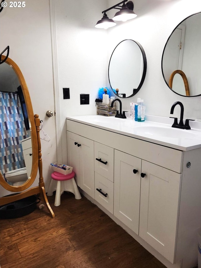 729 NW Evans St, Sheridan, OR 97378 - full bathroom with wood finished floors and double vanity