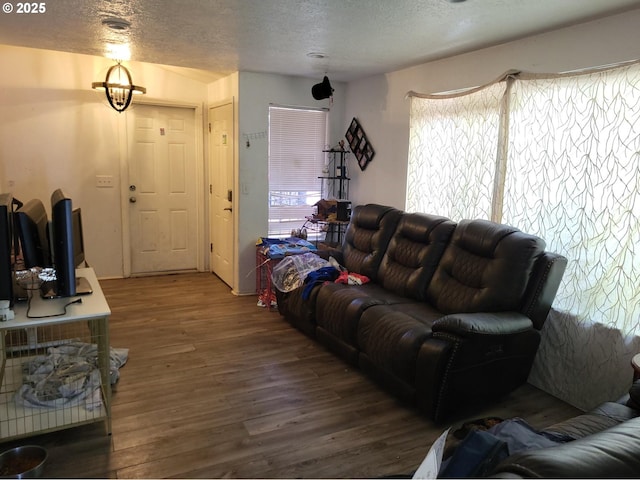 729 NW Evans St, Sheridan, OR 97378 - living area featuring wood finished floors and a textured ceiling